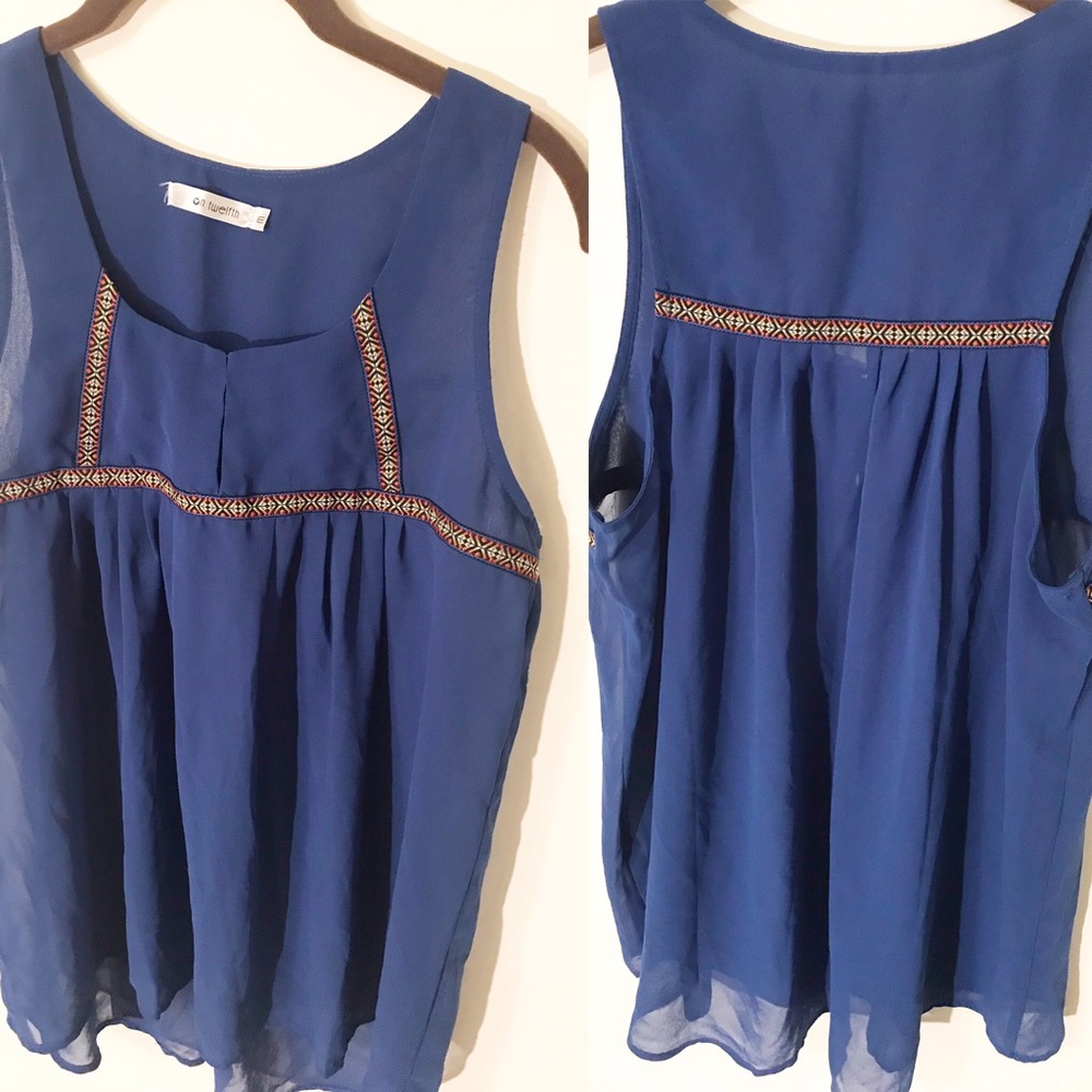 On twelfth sheer tank sleeveless top in blue A40